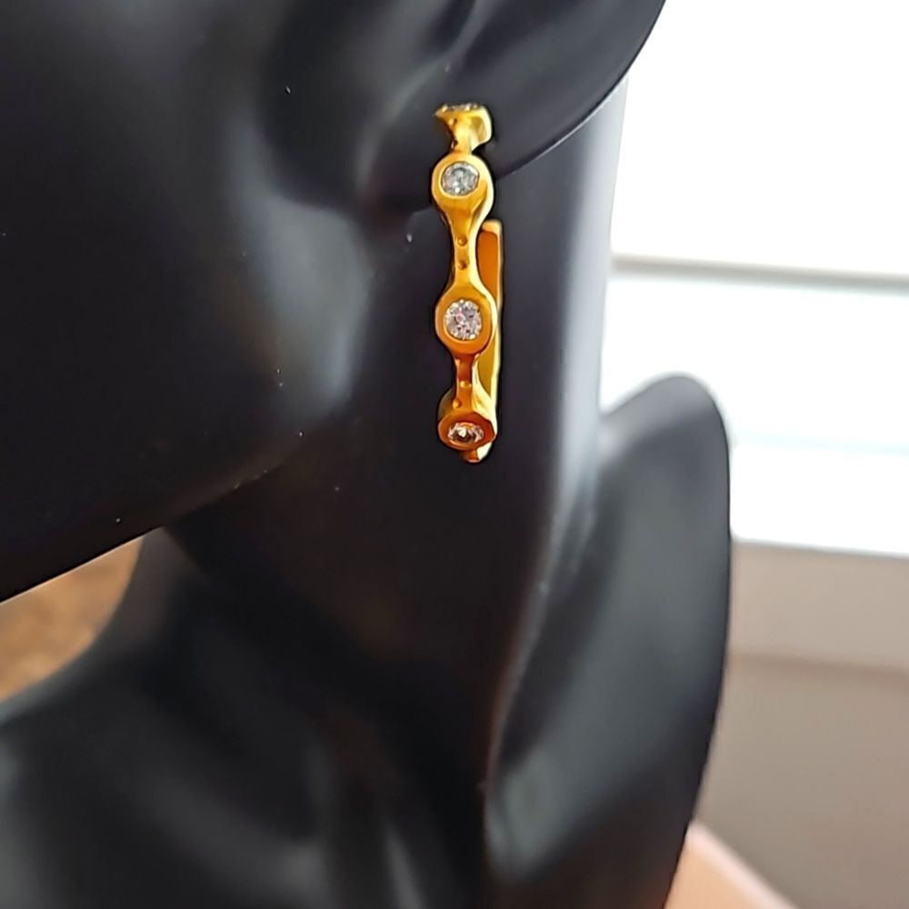 Vintage gold toned hoop earrings with crystals